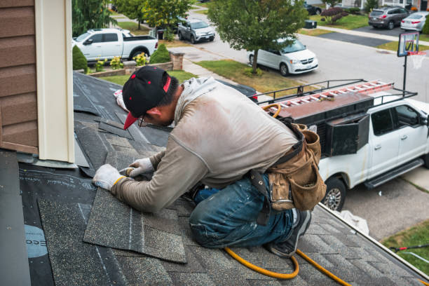 Professional Roofing technician working in Deanville, TX